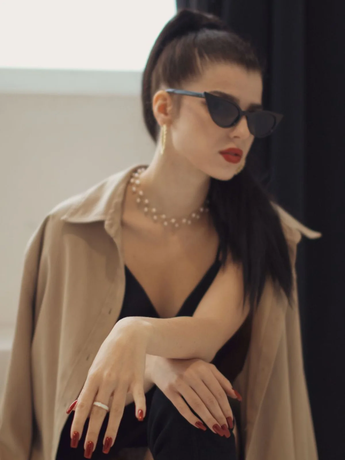 A model wearing Amarelle jewellery