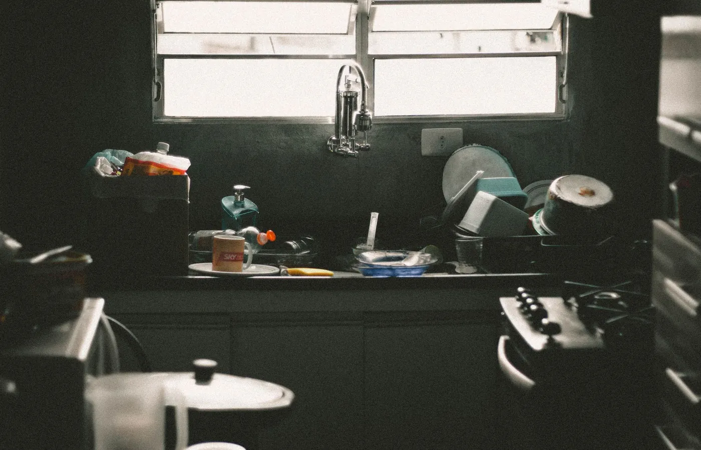 Kitchen sink and drain line, before