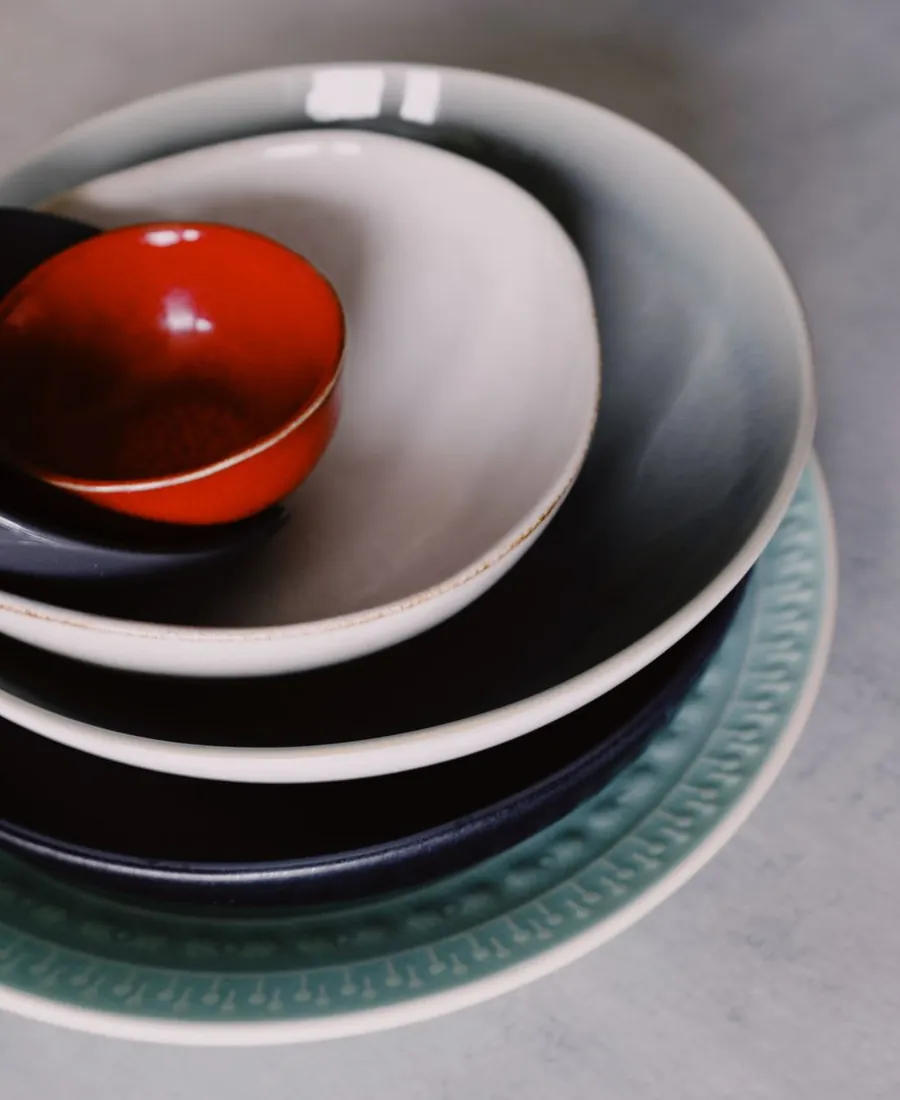 Stacked bowls in oatmeal glaze