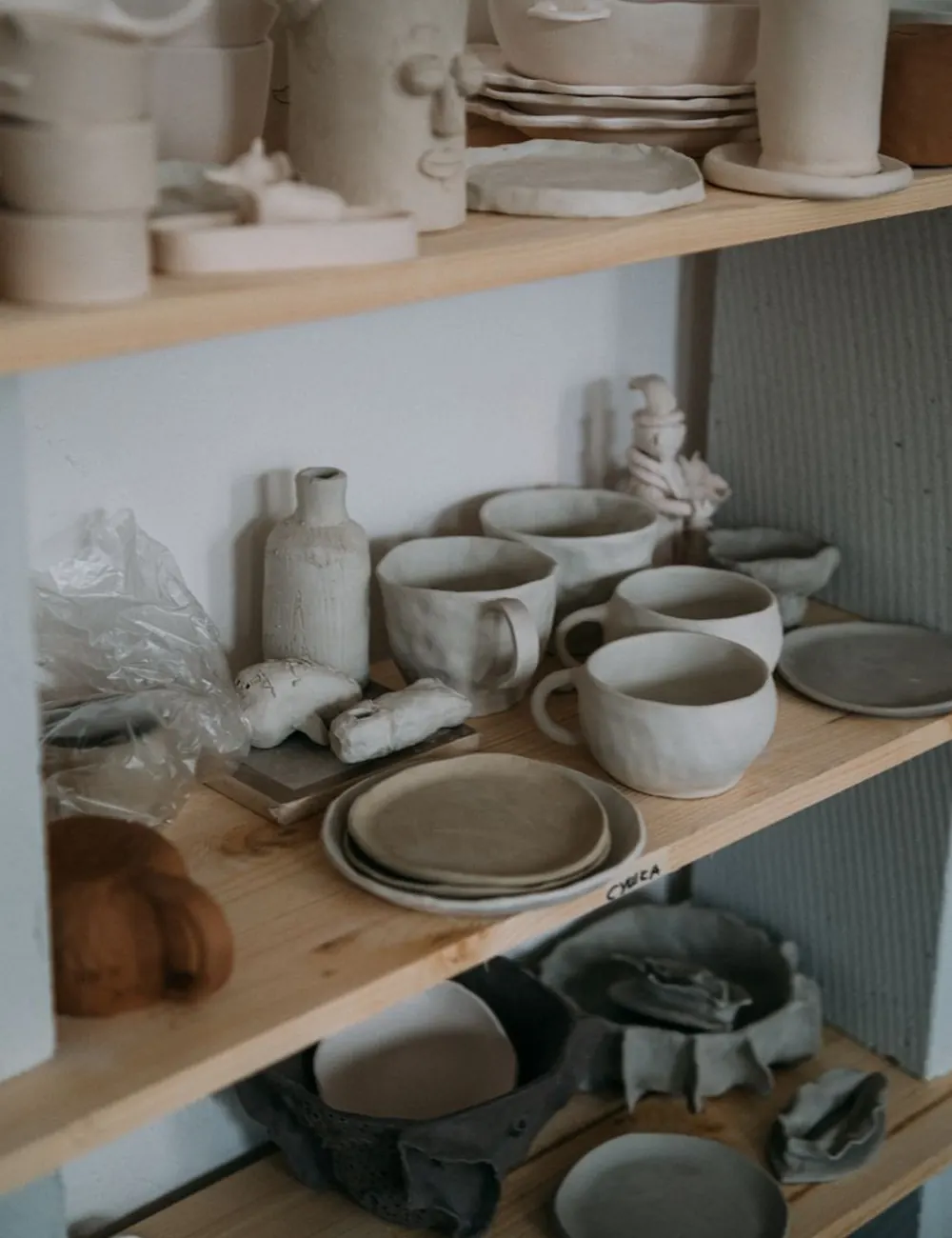 Bisque shelves waiting for glaze