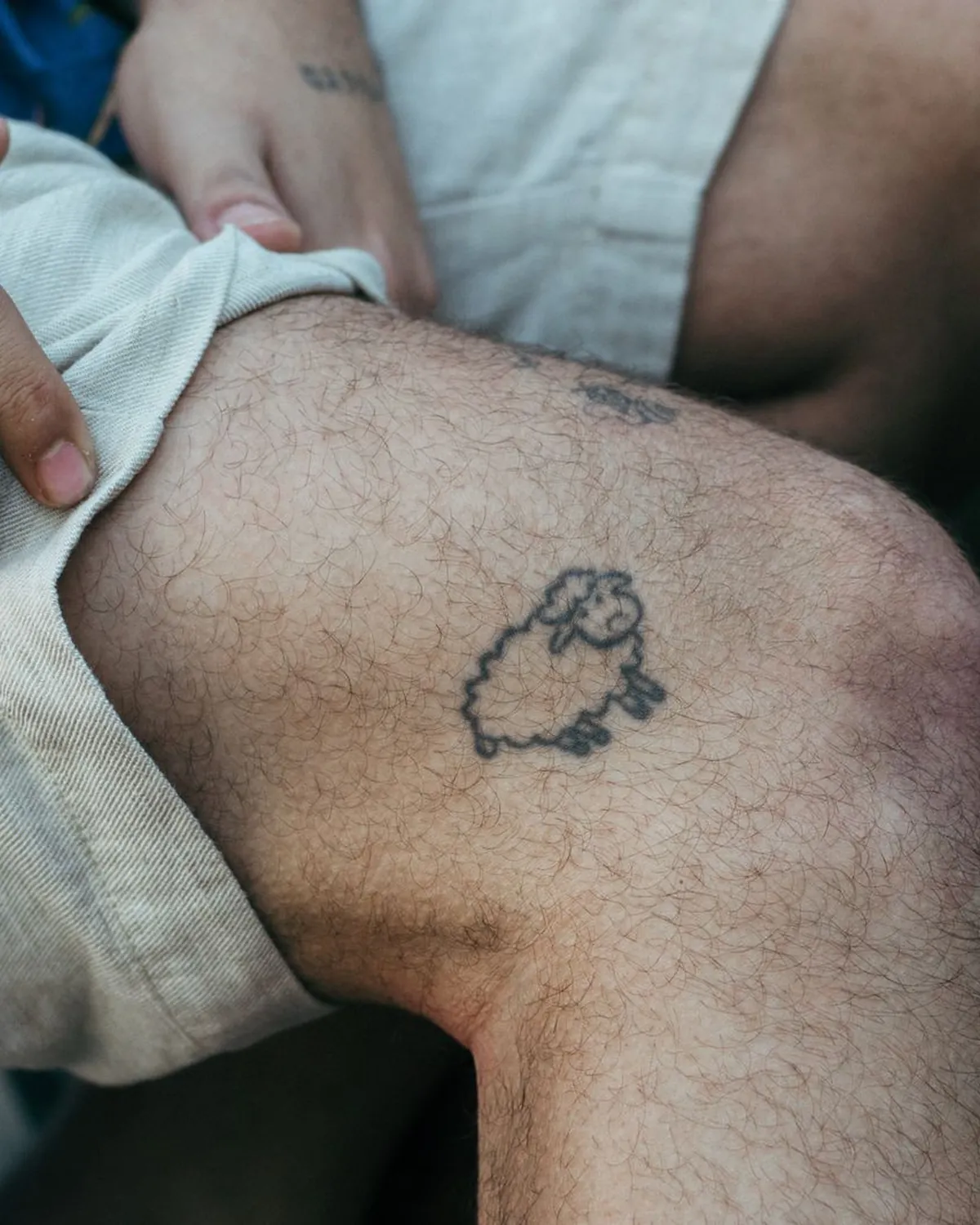 Little sheep, Fine-line tattoo on the Above the knee by Mara D'Souza