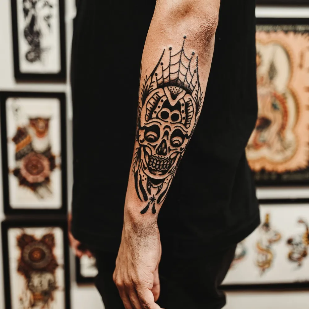 Skull & web, Traditional tattoo on the Forearm by Rohan Bhatt