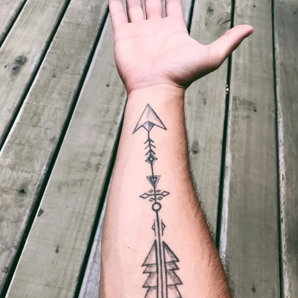 Arrow, Geometric tattoo on the Forearm by Kabir Rao