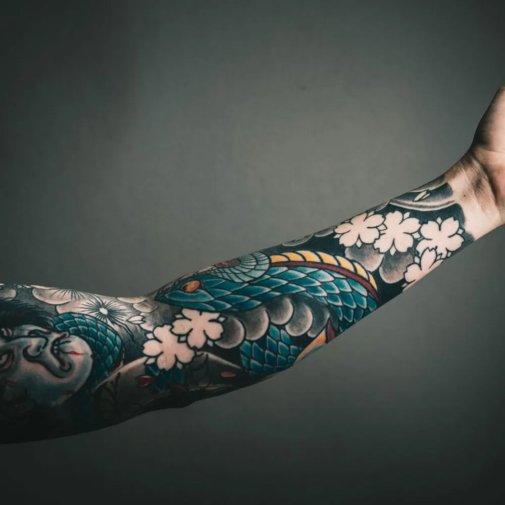 Shoulder florals, Fine-line tattoo on the Shoulder by Isha Menon