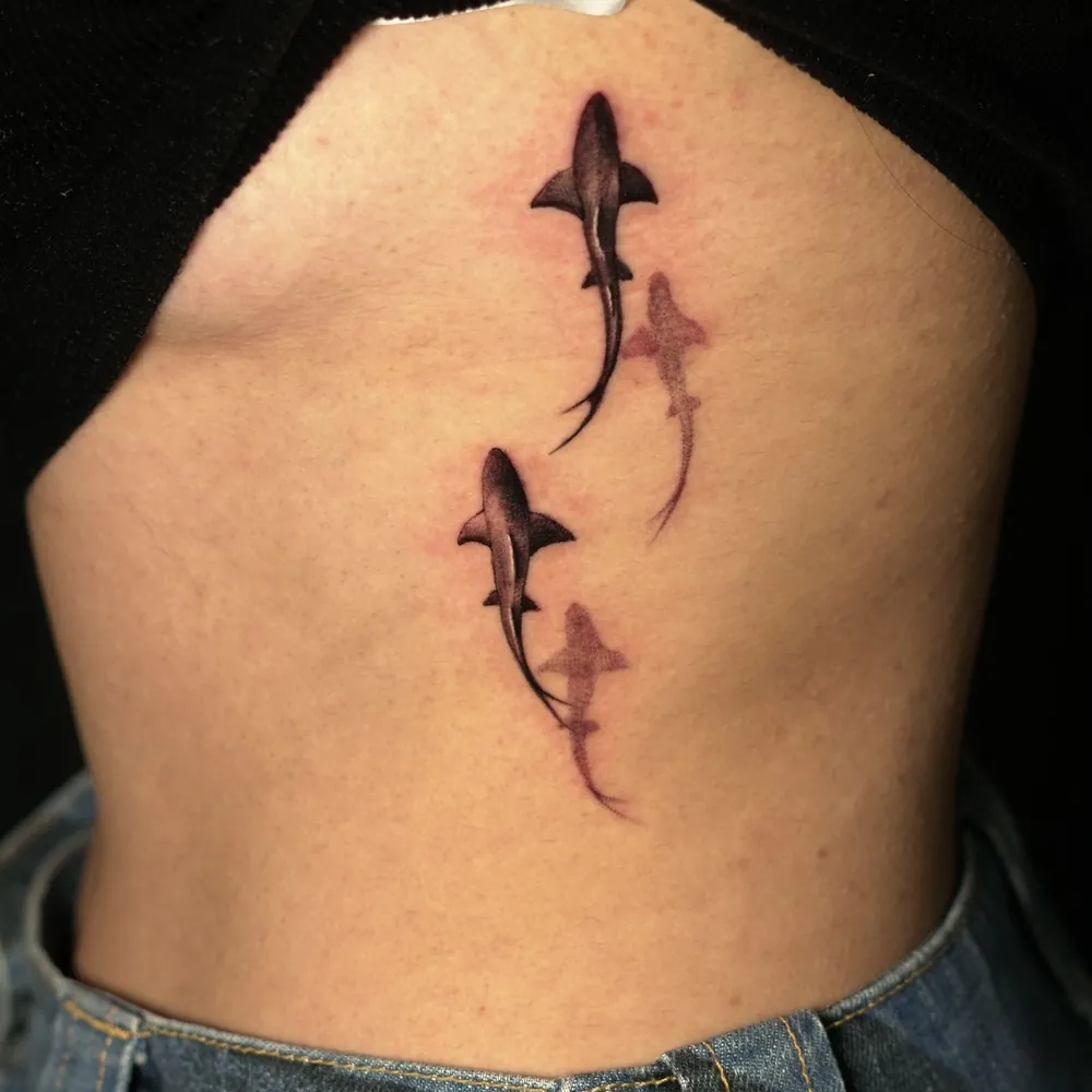 Two sharks, Realism tattoo on the Ribs by Rohan Bhatt